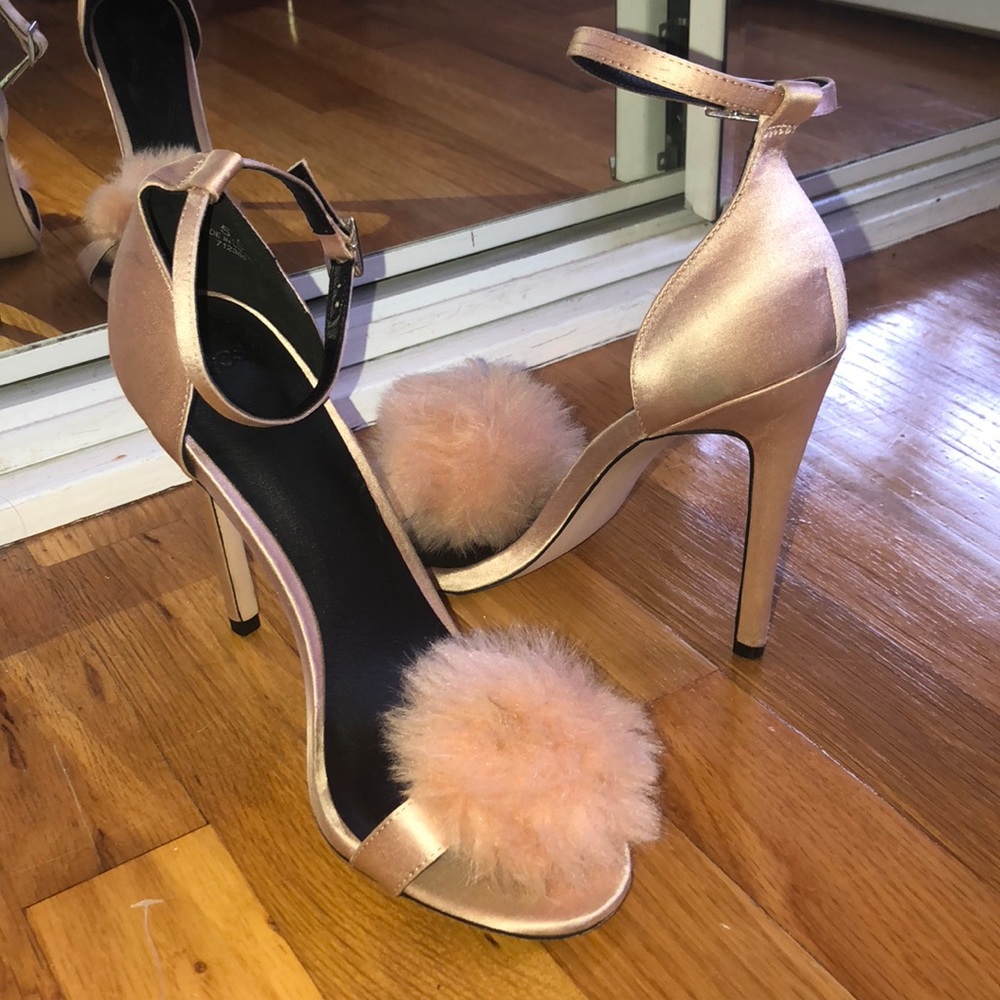 Pink pumps with Pom poms